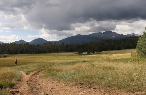 Upper Beaver Meadows. Why would anyone start out with clouds looking like that? See his wife down the path?