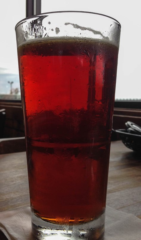 A tall glass of Southern Pecan beer from the Lazy Magnolia Brewery