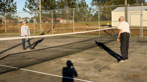 Carol (sil) and Leland (brother). Showing them how to play Pickleball.